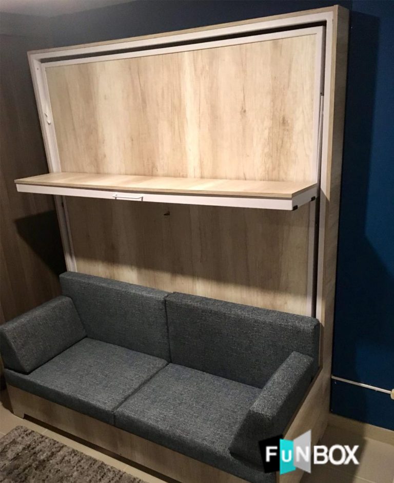 cama abatible vertical medellin bogota con repisa y sofá